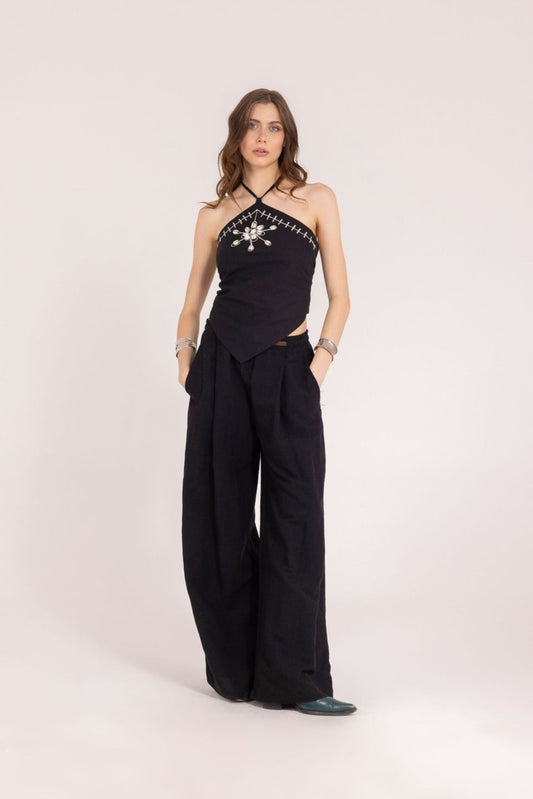 PANTALONE CON BORCHIE