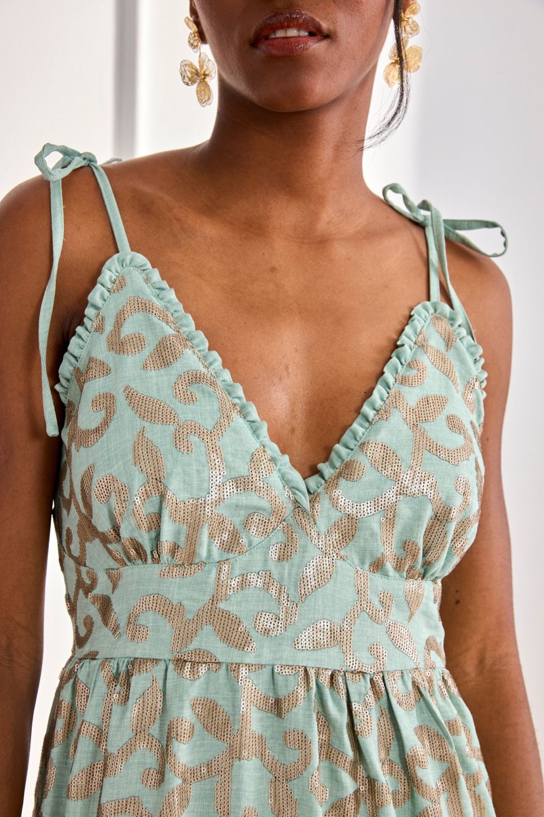 ABITO CON PAILLETTES DAELIN
