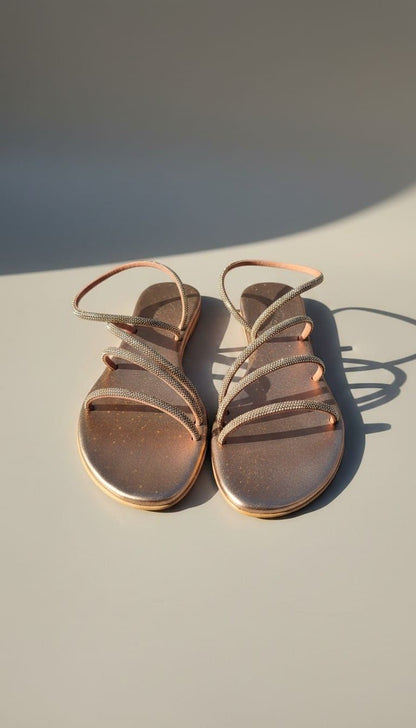 Sandali Santorini Kima con strass e fondo bronzo, coppia vista frontale.